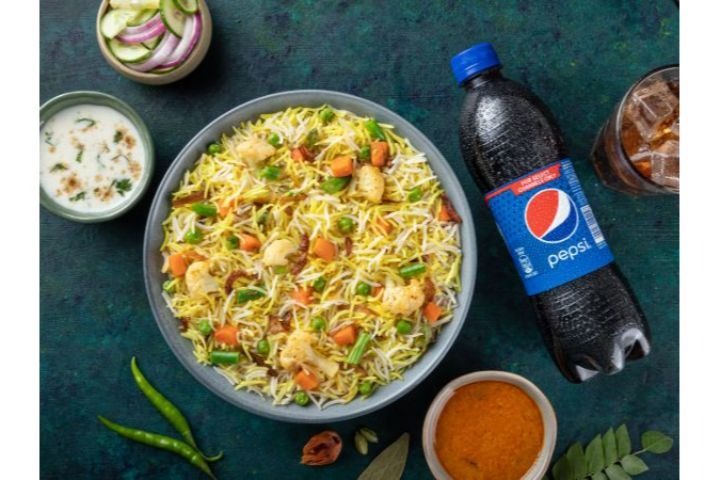 Veg Biryani With Pepsi